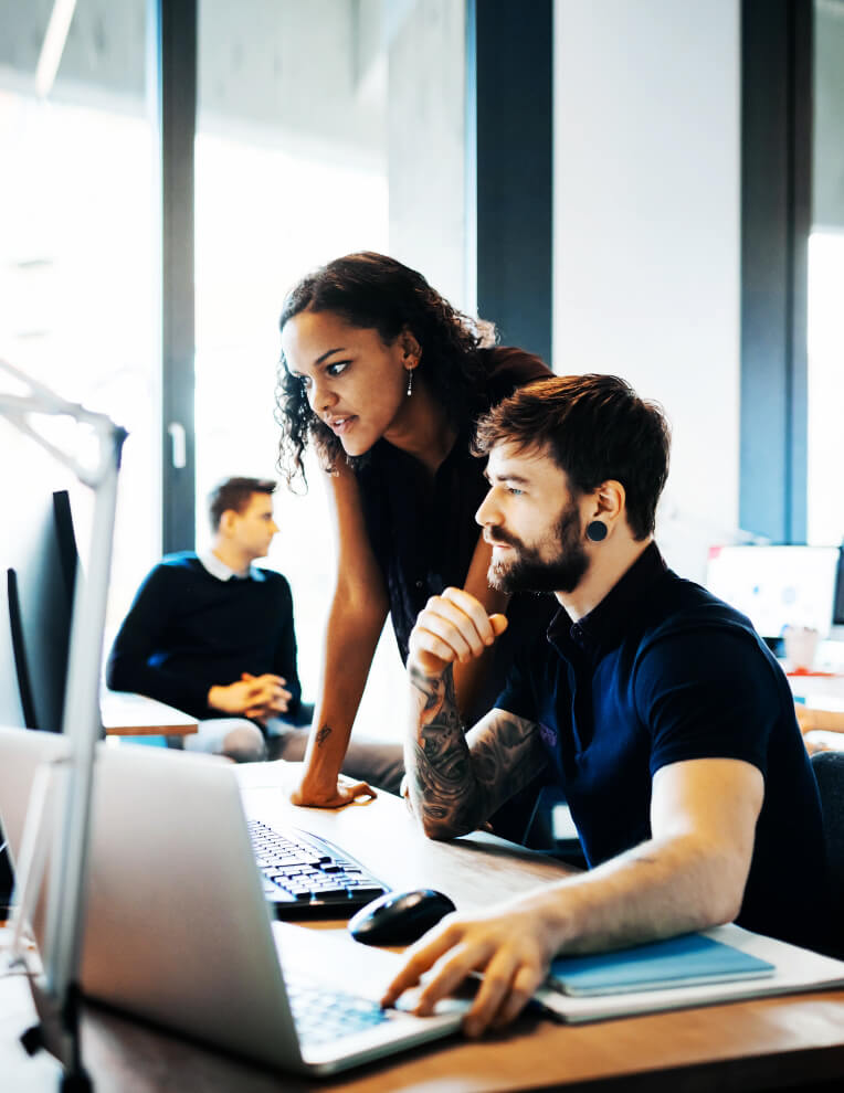 office space with employees on computers