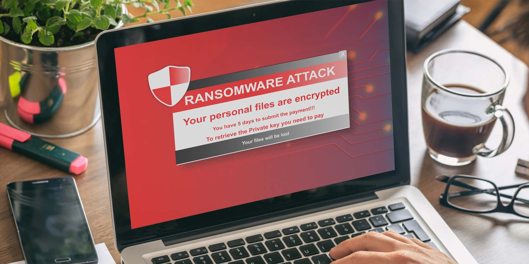 ransomware attack popup screen on laptop